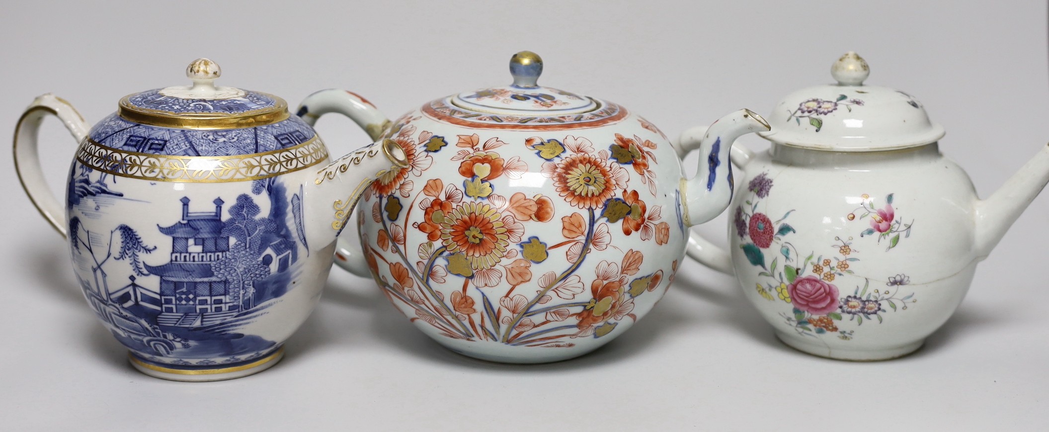 Four 18th century Chinese Export porcelain teapots. Tallest 15cm